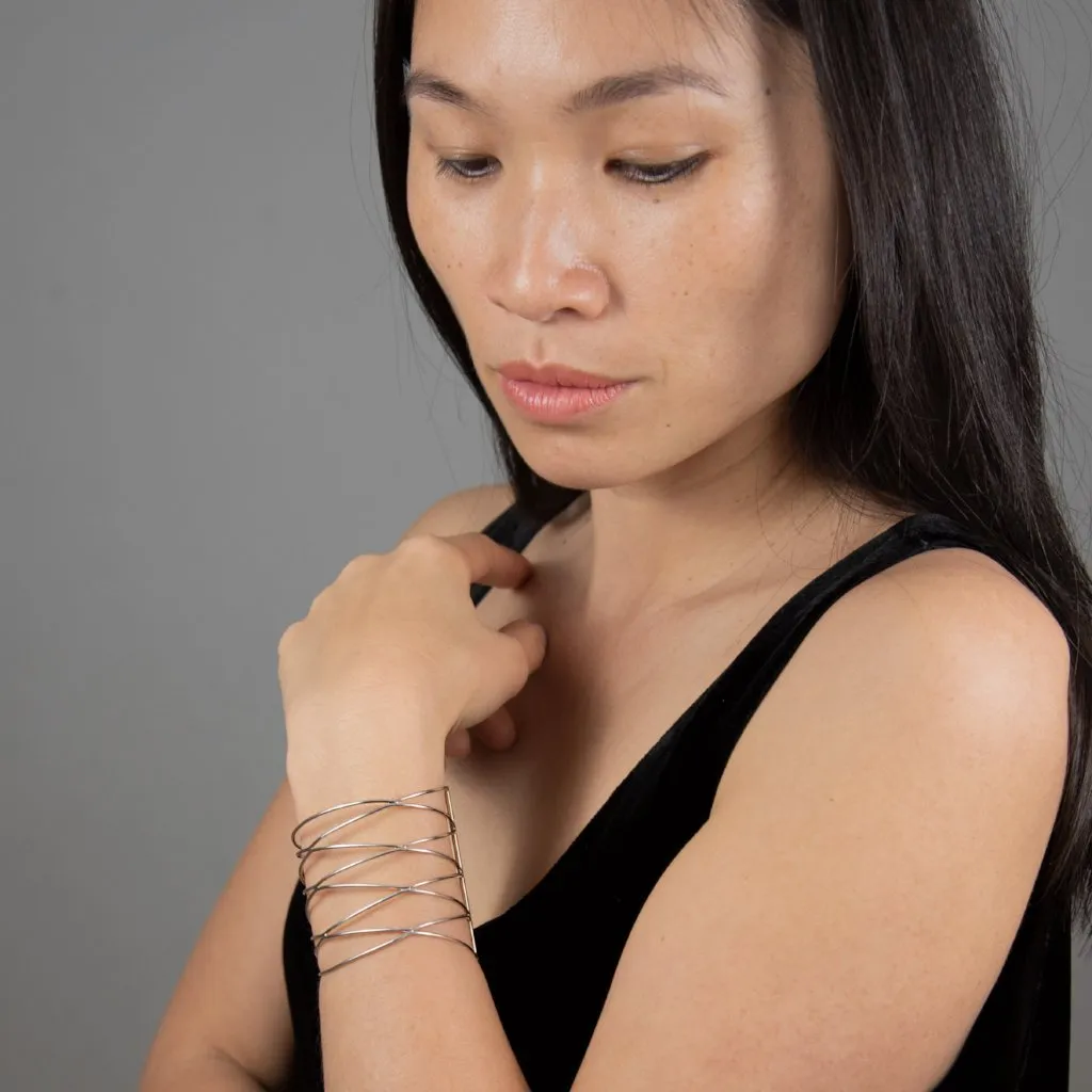 CONNECTION Cuff: Yellow gold and sterling silver