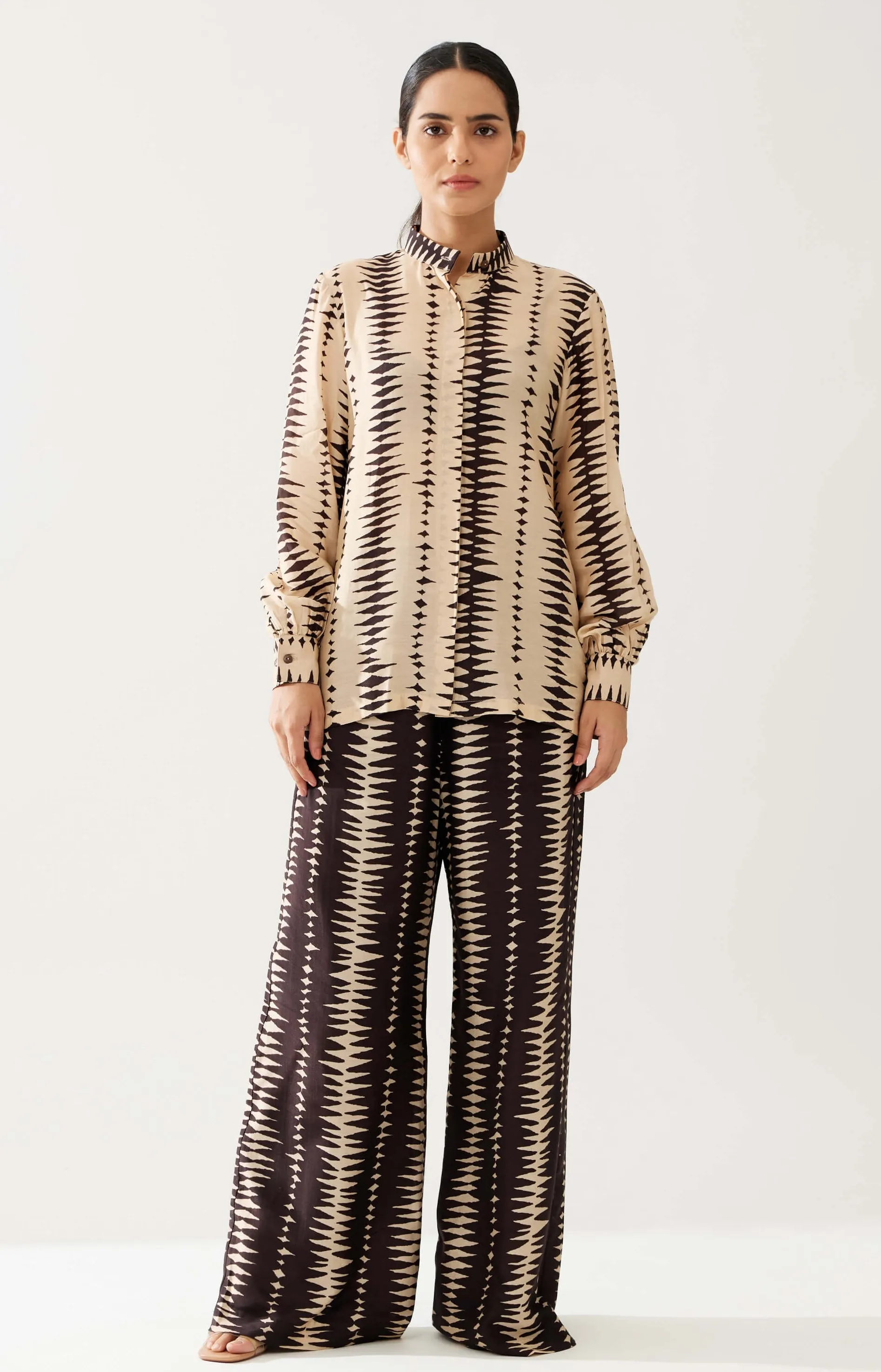 Cream and dark brown shirt and pants