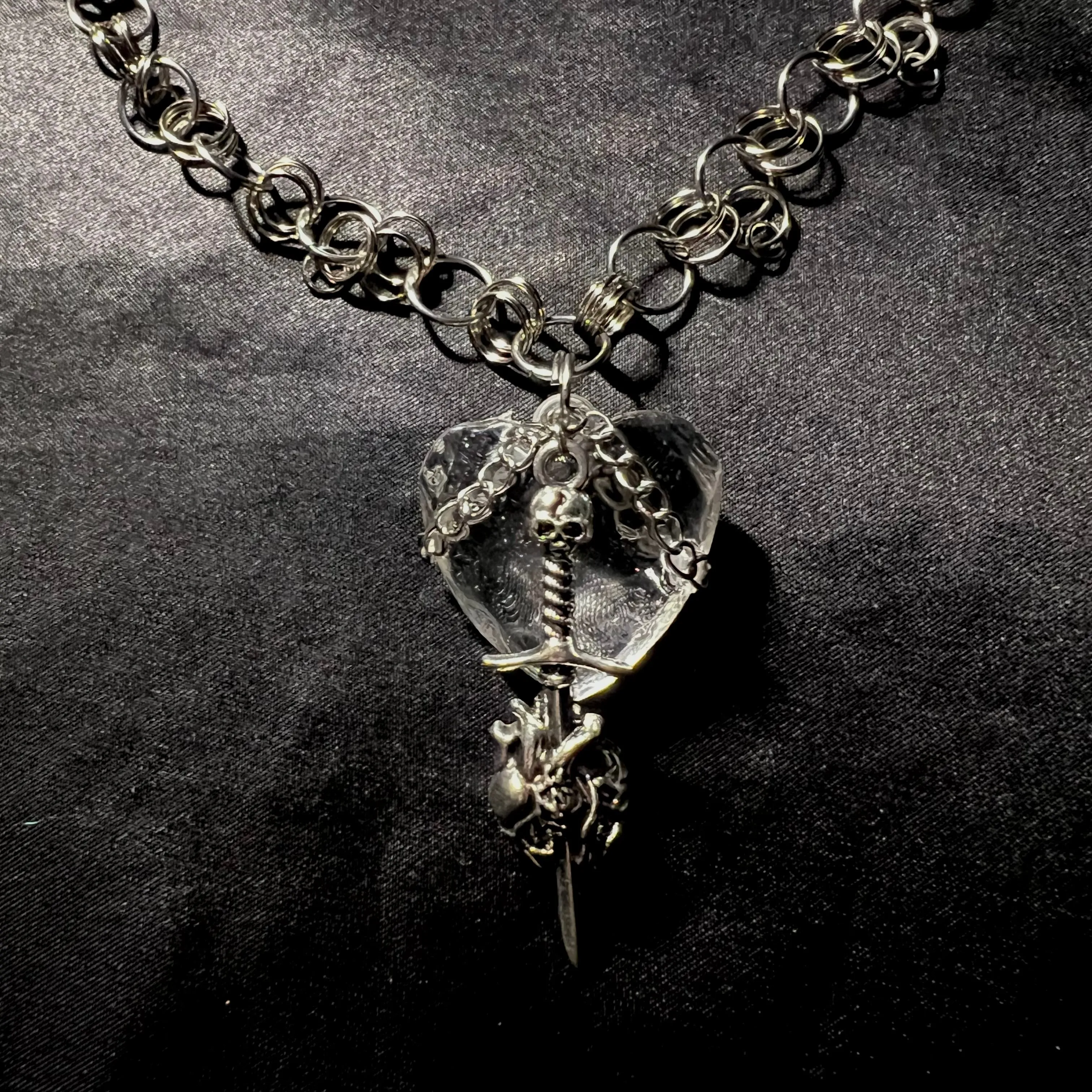 crystal heart sword necklace.