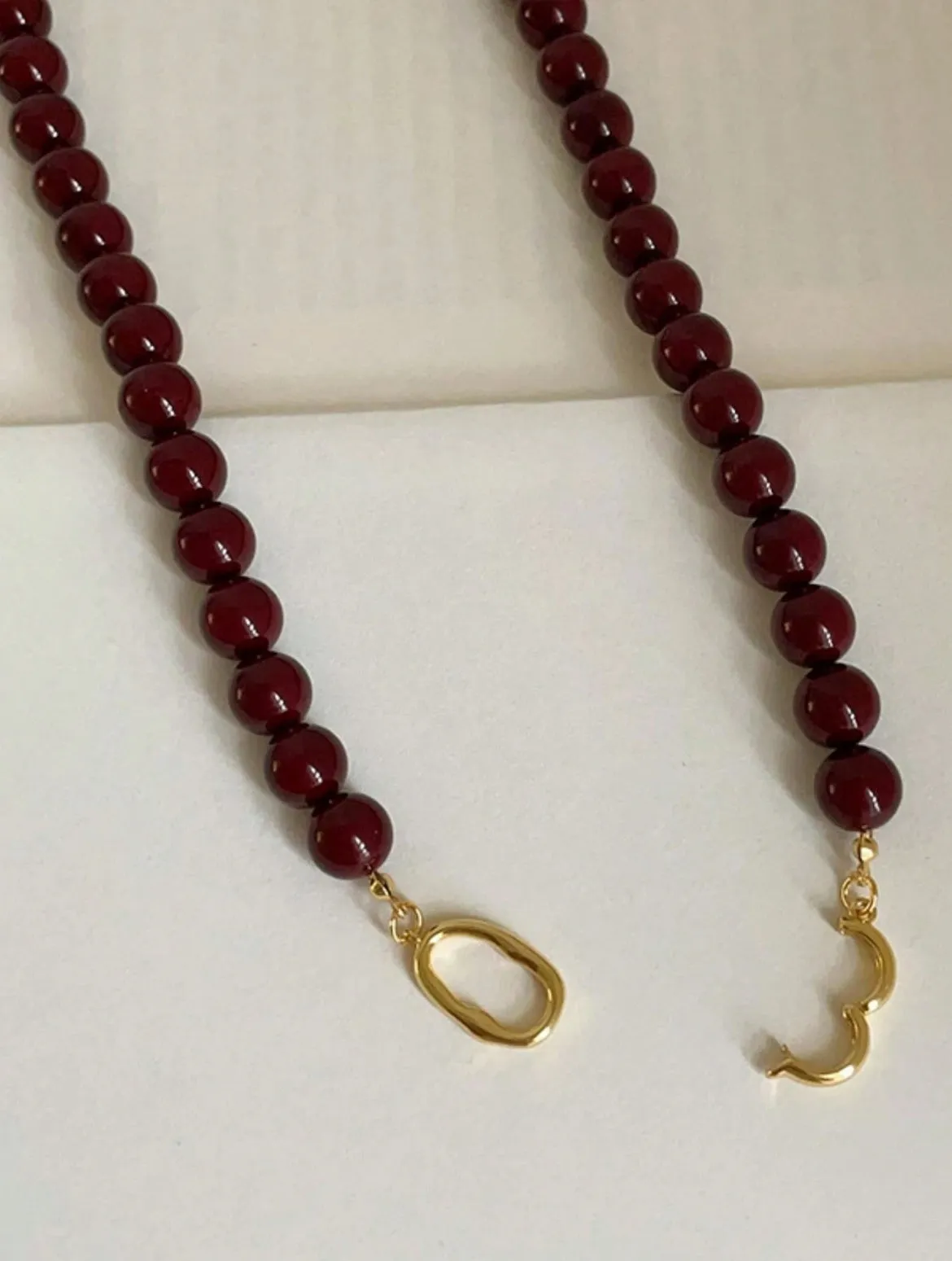 DEEP RED BEADED NECKLACE