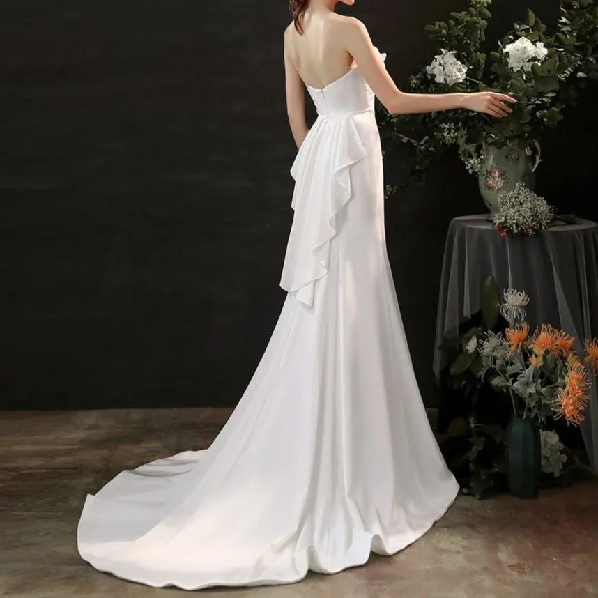 Satin hand-beaded white wedding dress with waist