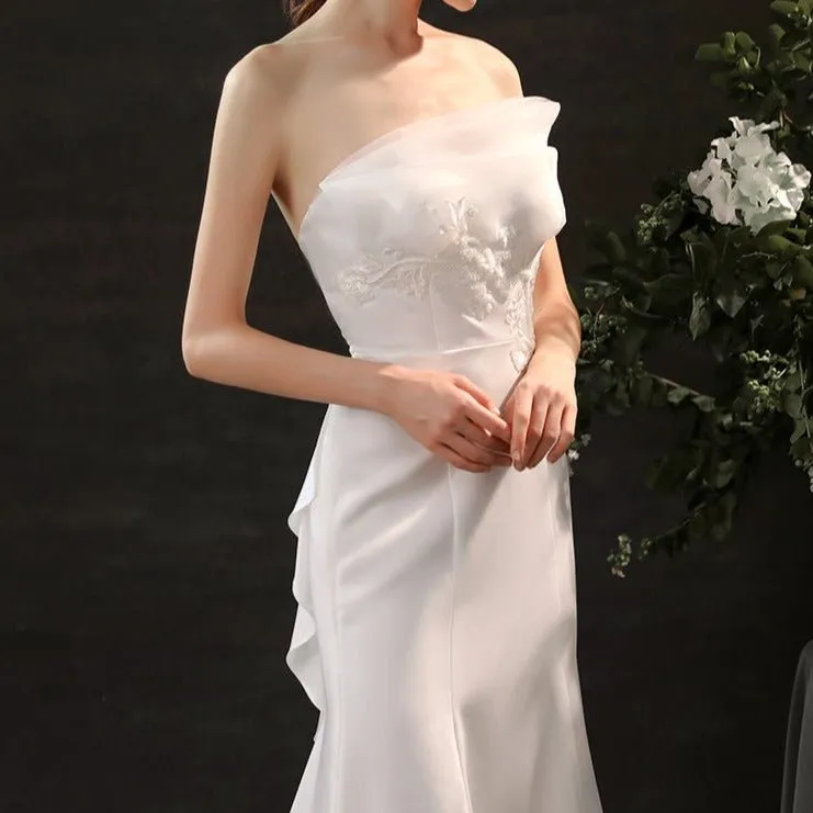 Satin hand-beaded white wedding dress with waist