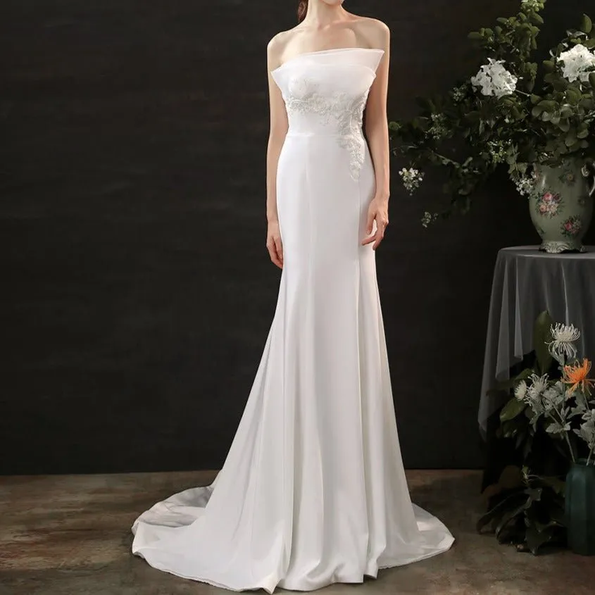 Satin hand-beaded white wedding dress with waist