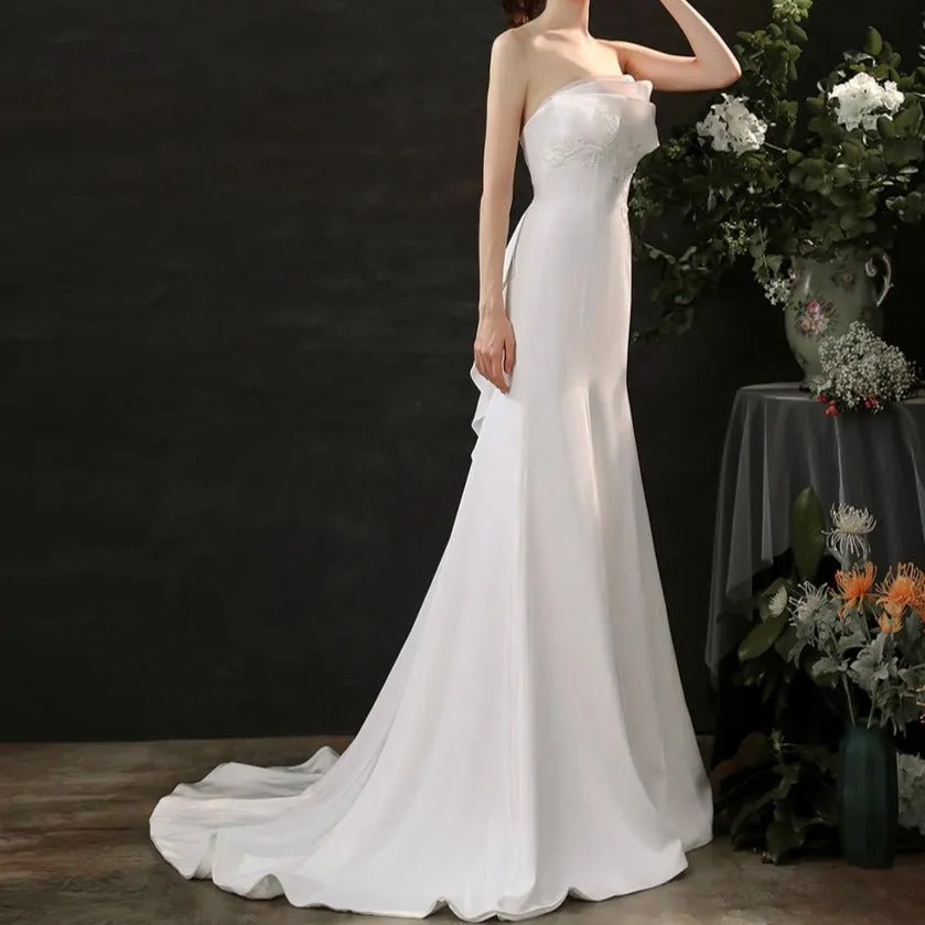 Satin hand-beaded white wedding dress with waist