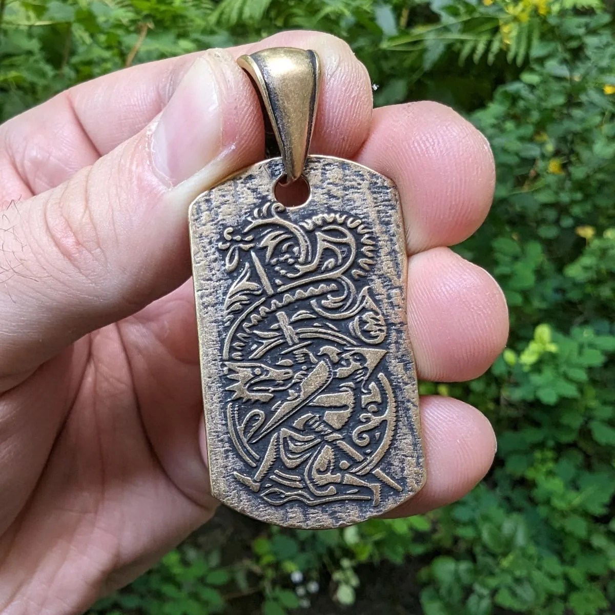 Sigurd and Fafnir Aegishjalmur bronze pendant