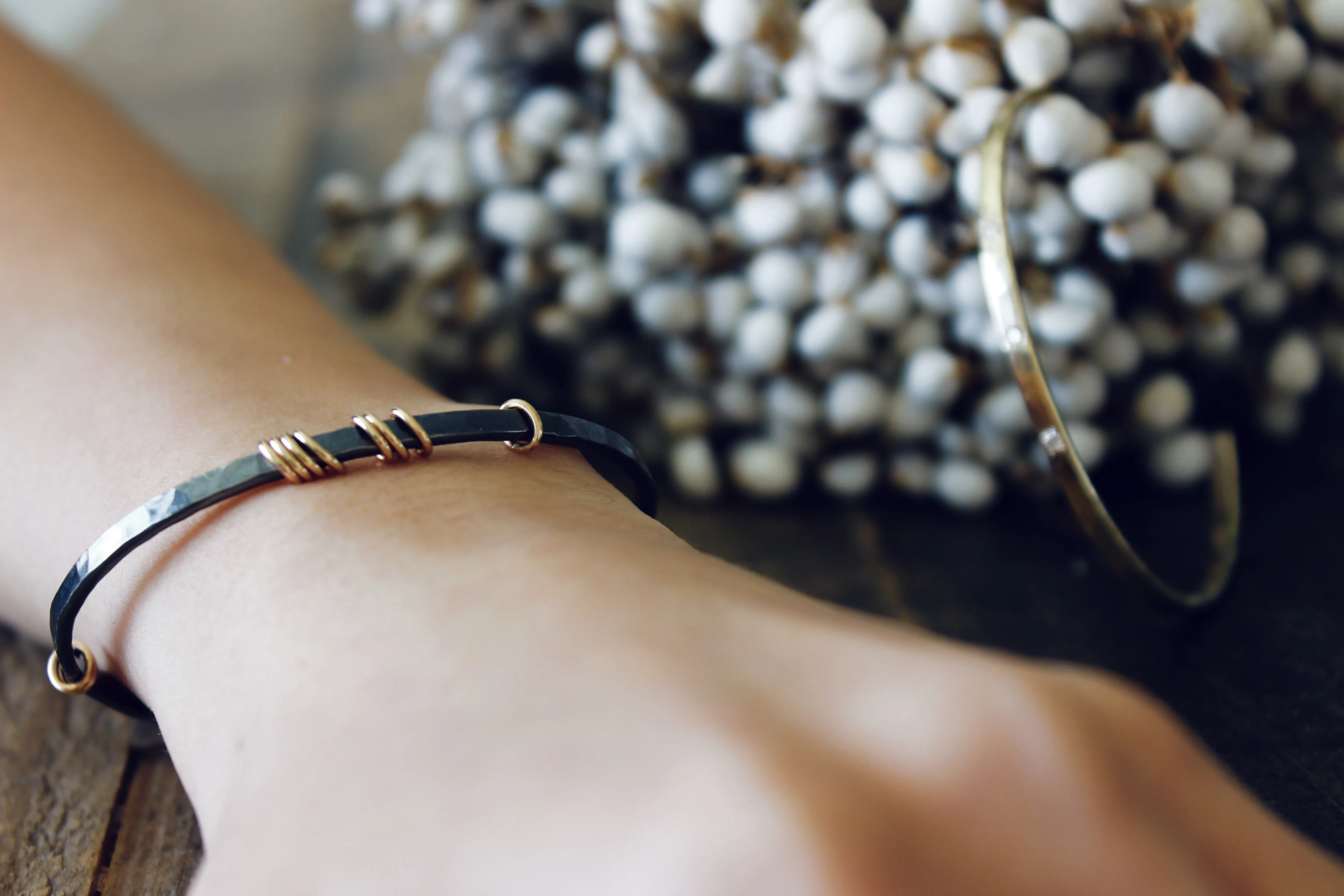 Sterling silver bracelet with 14k gold rings