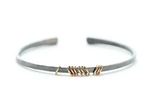 Sterling silver bracelet with 14k gold rings